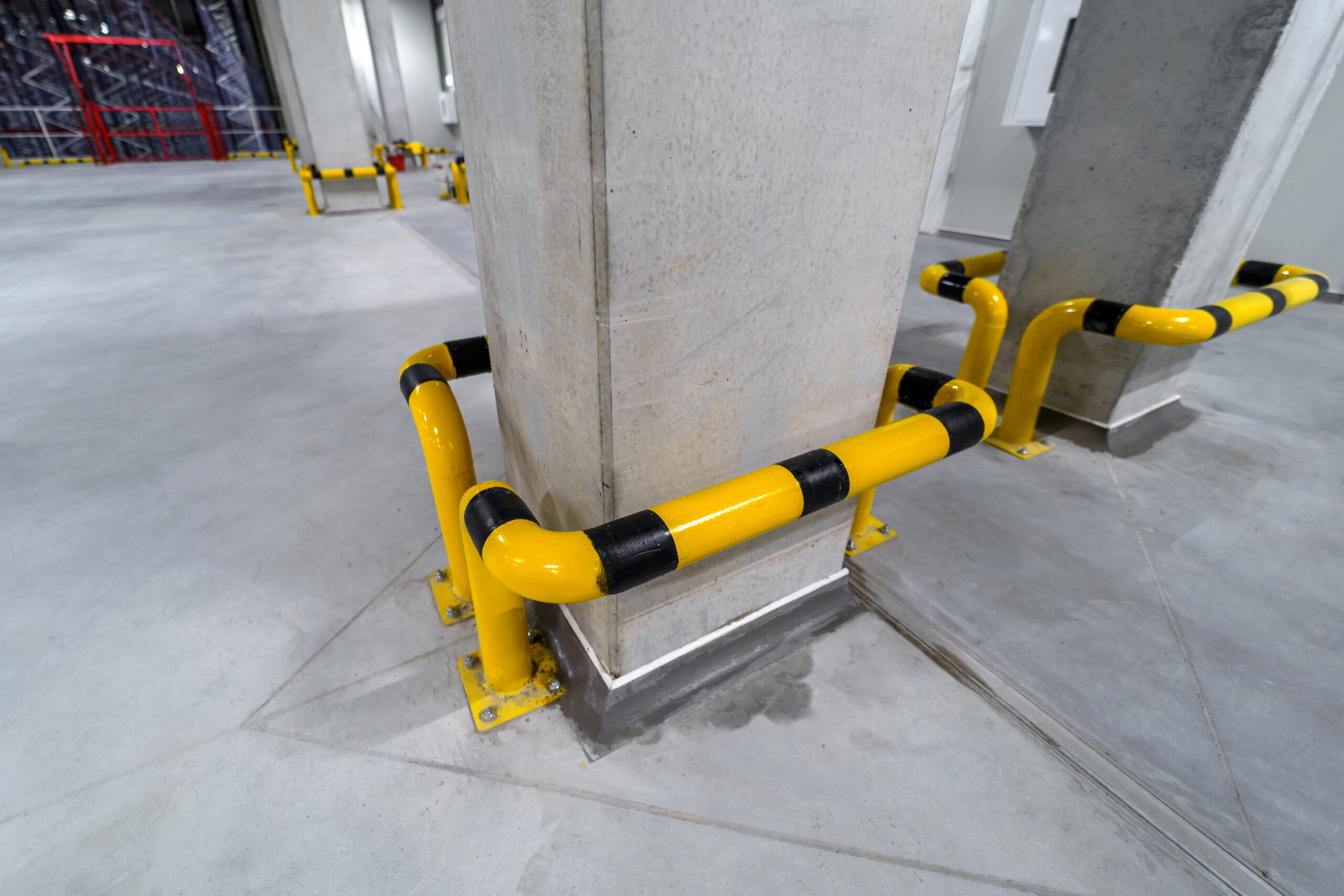 Metal bumpers for the warehouse. Protection of walls, columns and structures against vehicle collision